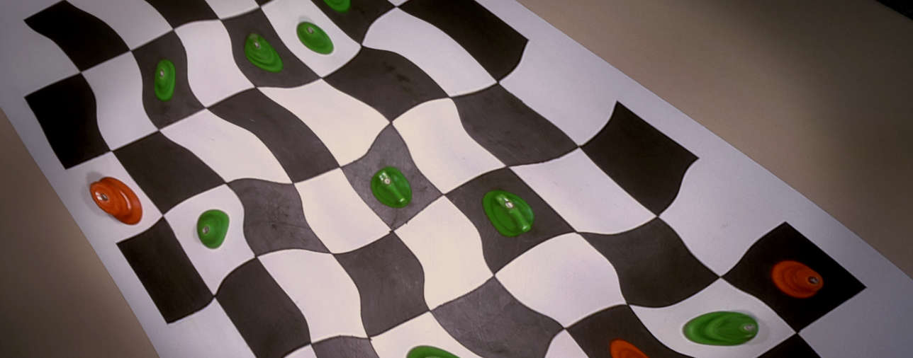 Abstract image of distorted chessboard.